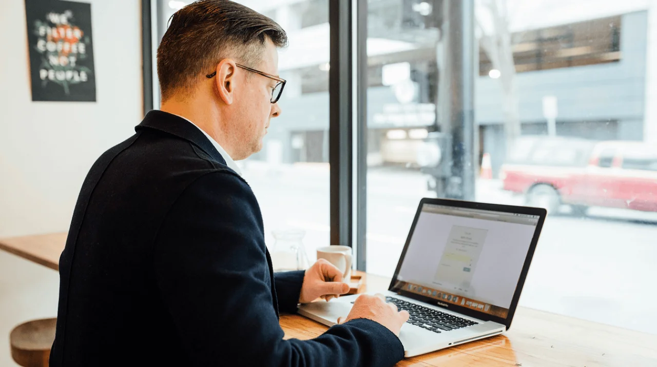 Business owner reviewing legal documents with caution signs highlighting contract errors, compliance issues