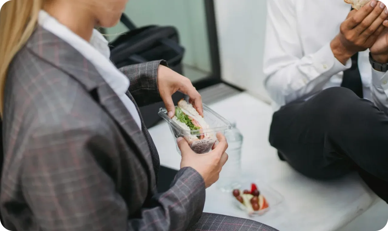 Person Eating A Sandwich