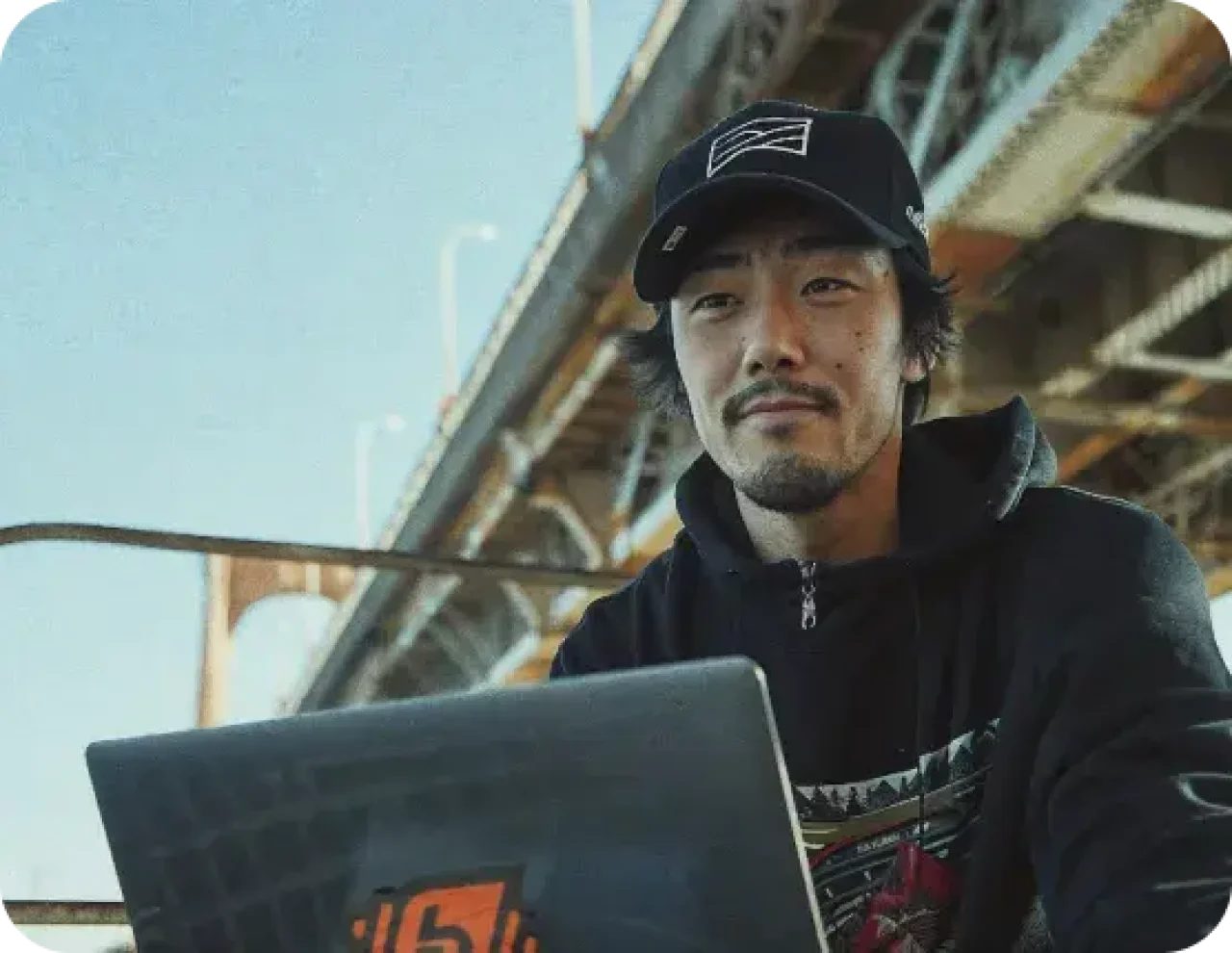 Man Working Outside With A Laptop 1