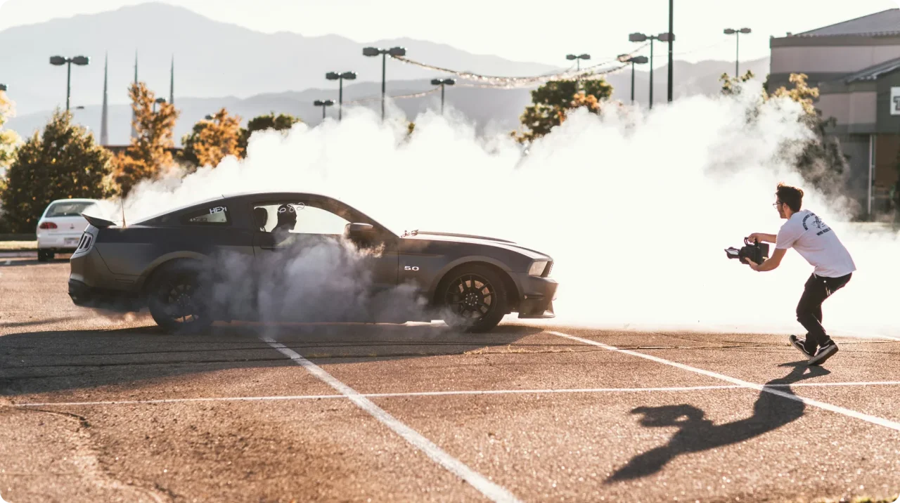 sports-car-drift-burnout-filmed-in-parking-lot
