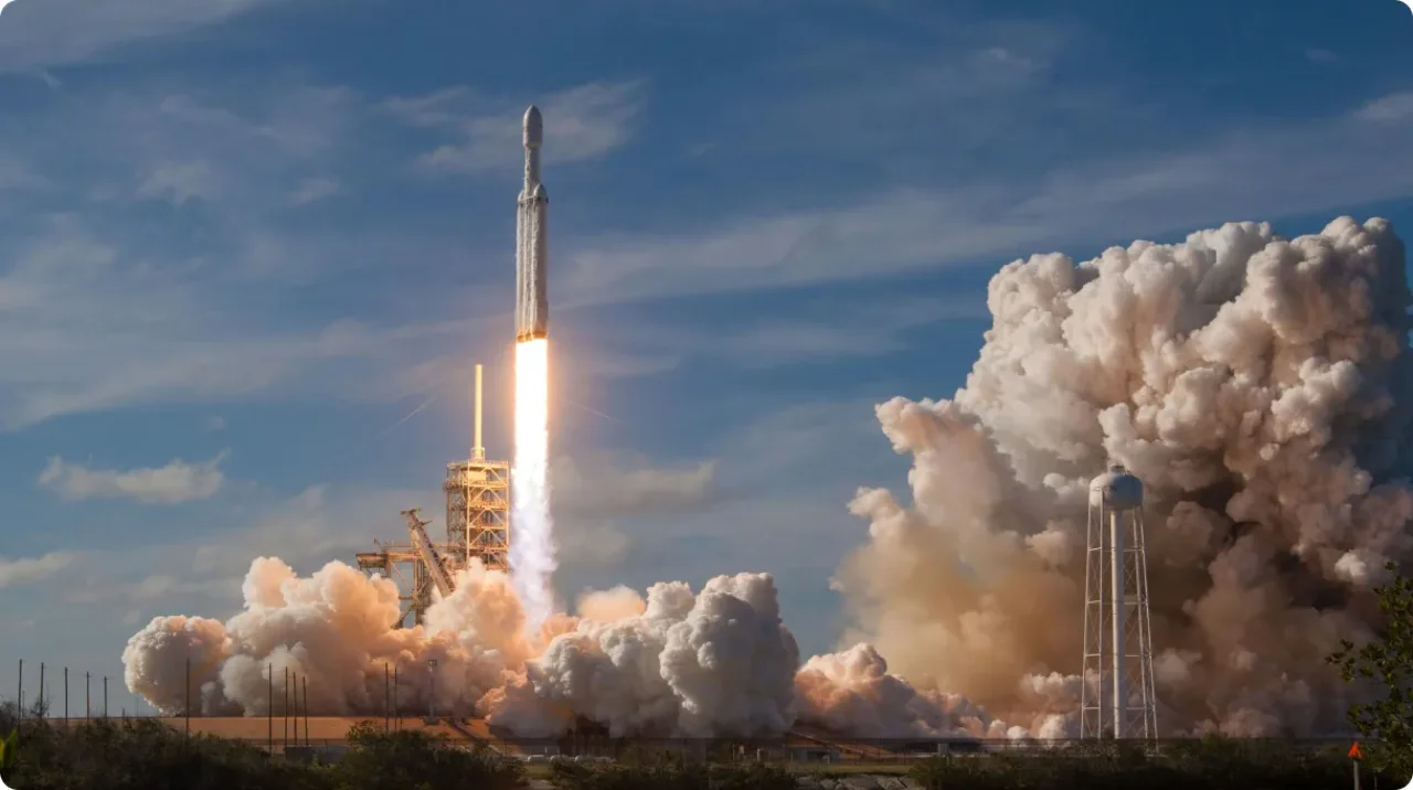 Three Men Sitting On Chair Beside Tables