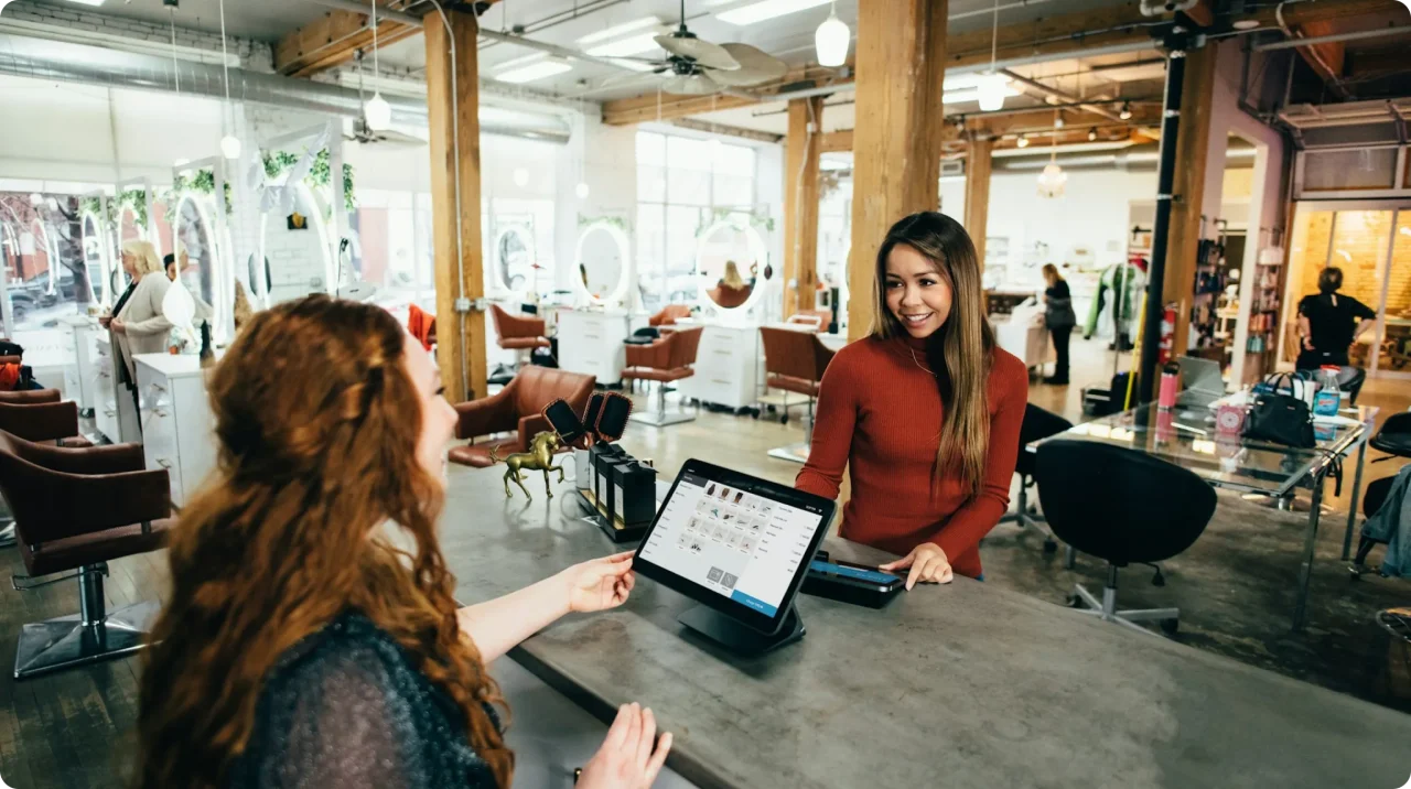 Two women near tables